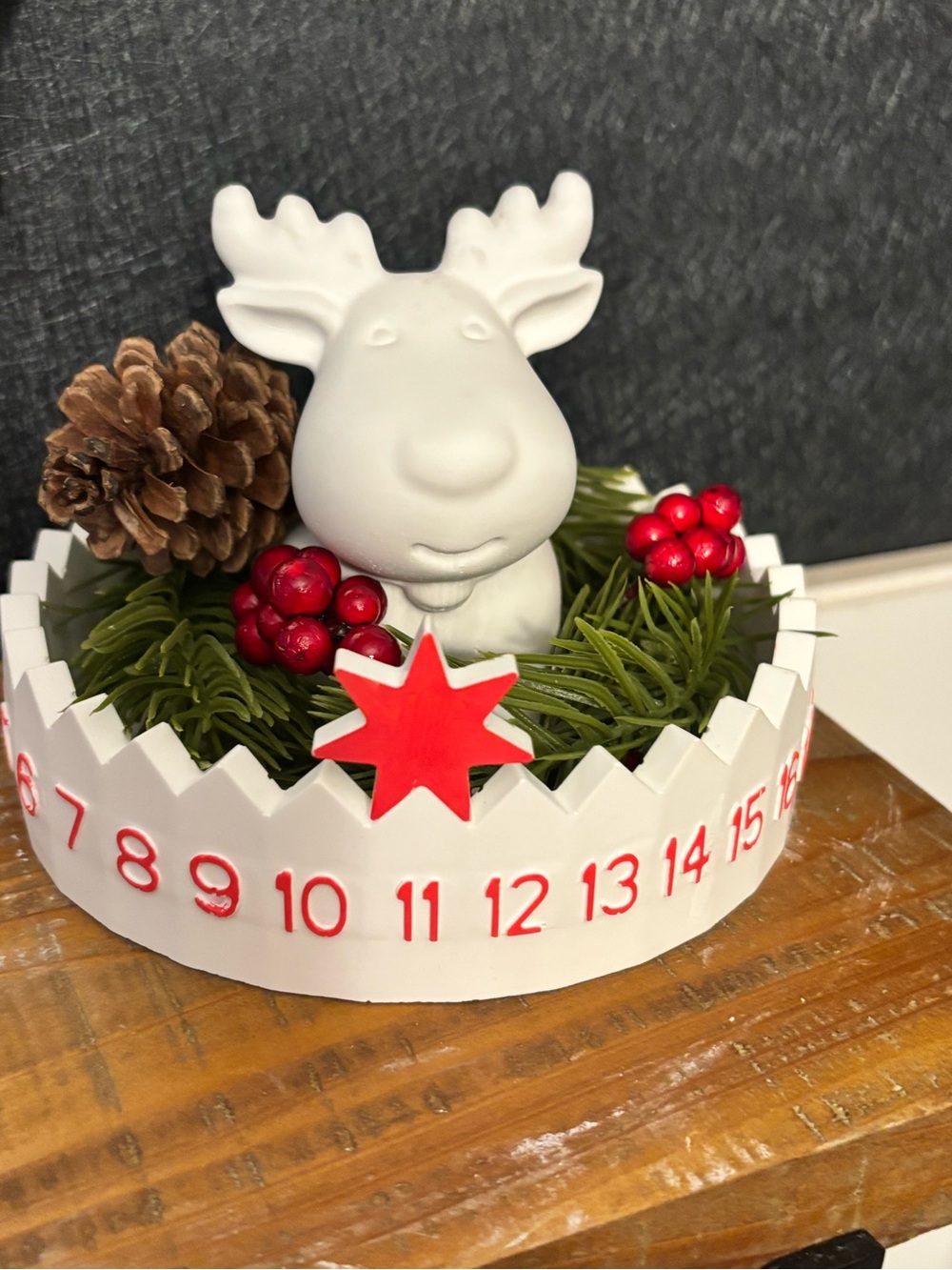 White Ceramic Reindeer Advent Countdown Decor with Red Accents